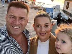 Karl Stefanovic and girls smile in a selfie taken outside